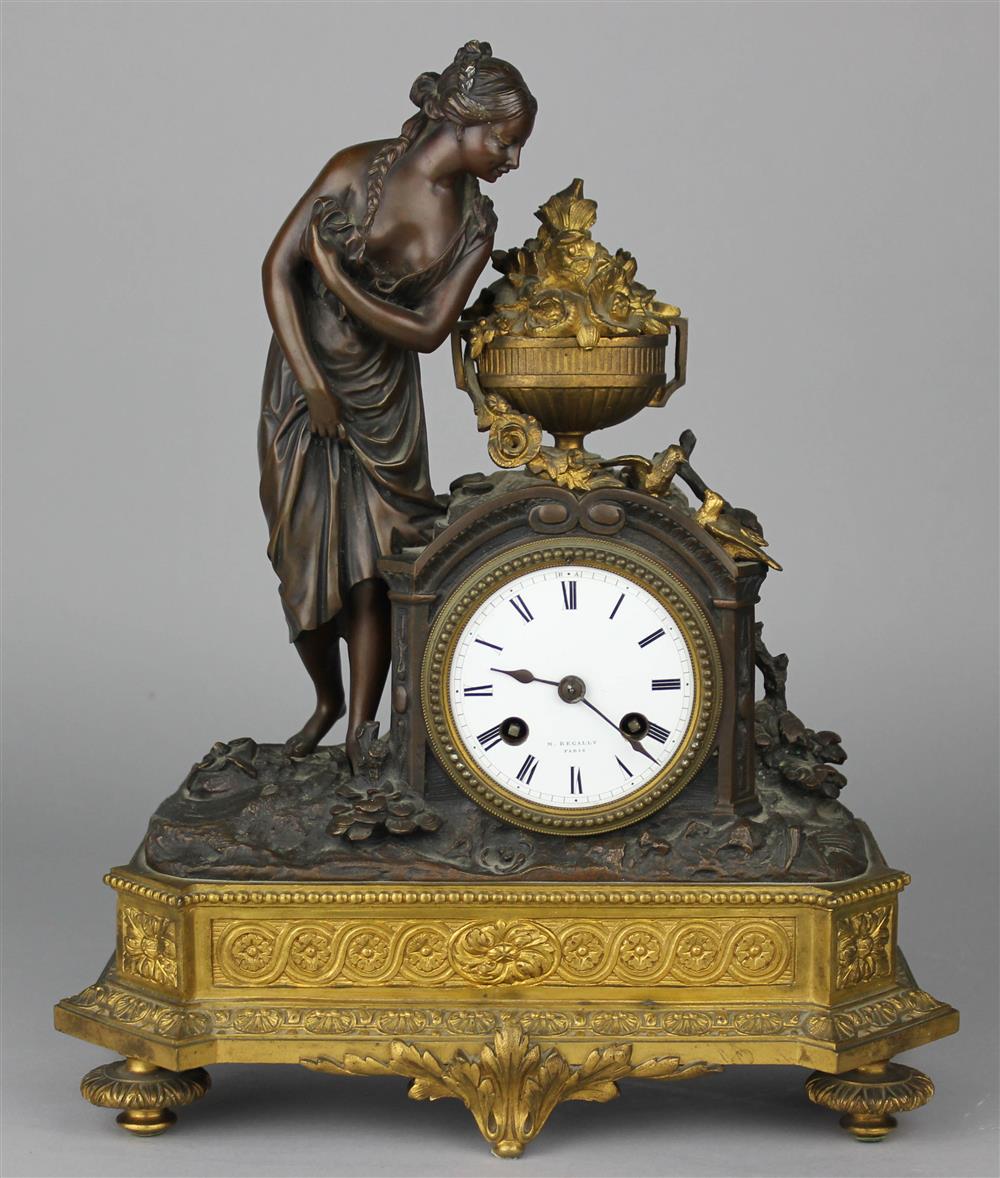 Appraisal: LOUIS XVI STYLE PARCEL GILT BRONZE MANTEL CLOCK the circular