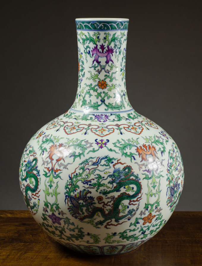 Appraisal: CHINESE QING DOUCAI PORCELAIN VASE bottle form with cartouches of