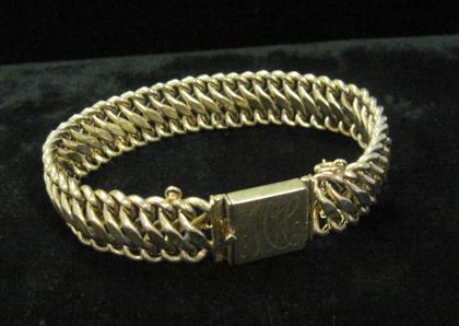 Appraisal: karat yellow gold braceletModified 'S' link with monogramed clasp