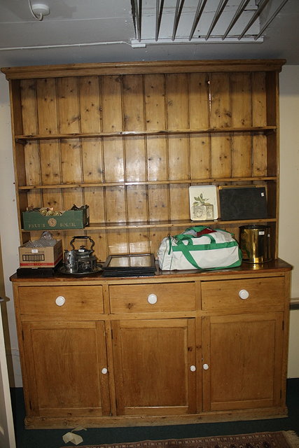 Appraisal: A VICTORIAN PINE LARGE KITCHEN DRESSER with raised back with