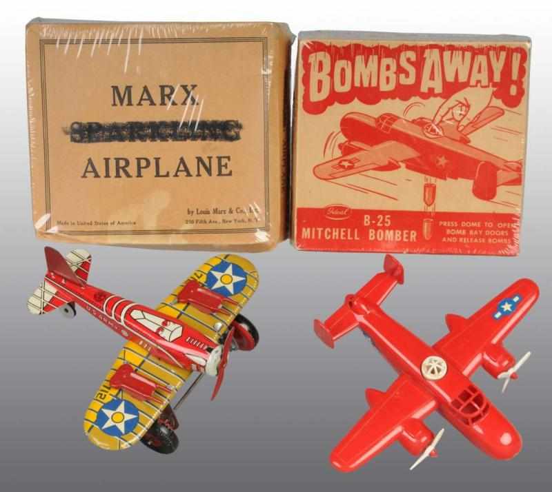 Appraisal: Lot of Airplane Toys Description American Includes one Marx tin