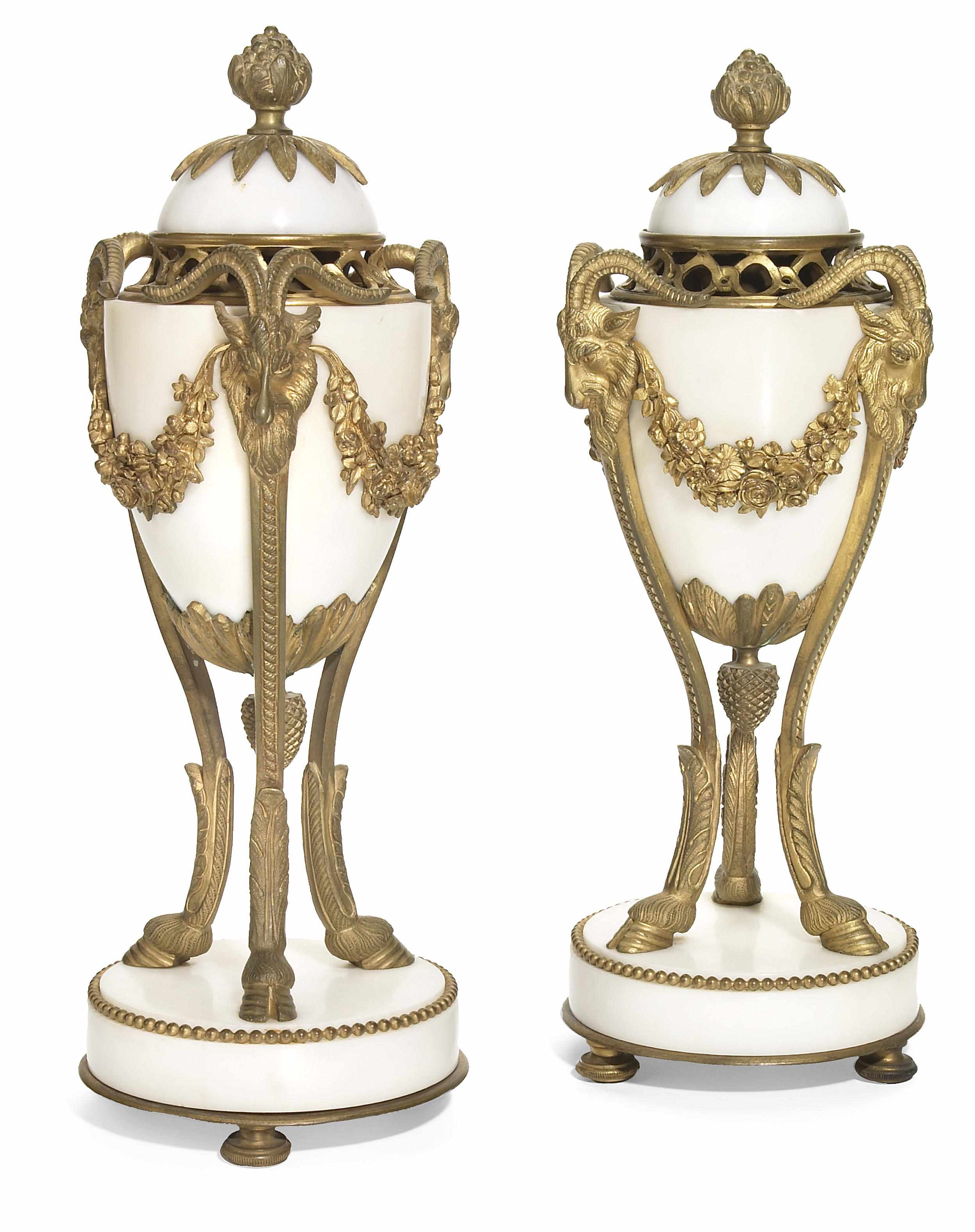 Appraisal: A pair of Louis XVI style gilt bronze and white