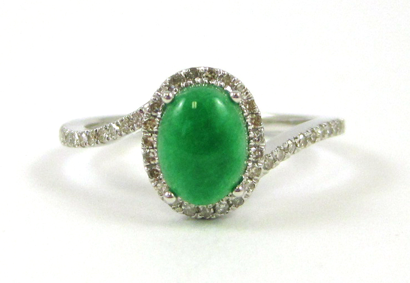 Appraisal: JADE DIAMOND AND FOURTEEN KARAT GOLD RING The white gold