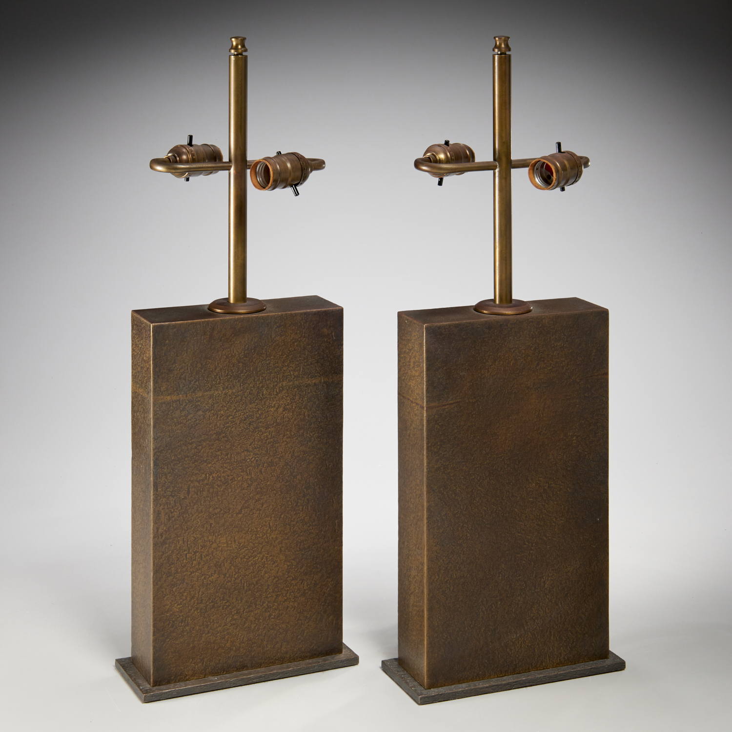 Appraisal: PETER MARINO PAIR CUSTOM BRONZE LAMPS SIGNED st c USA