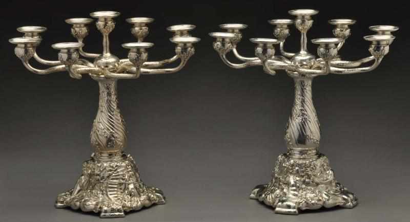 Appraisal: A Pair of Tiffany Silver Nine-Light Candelabra Ca Each base