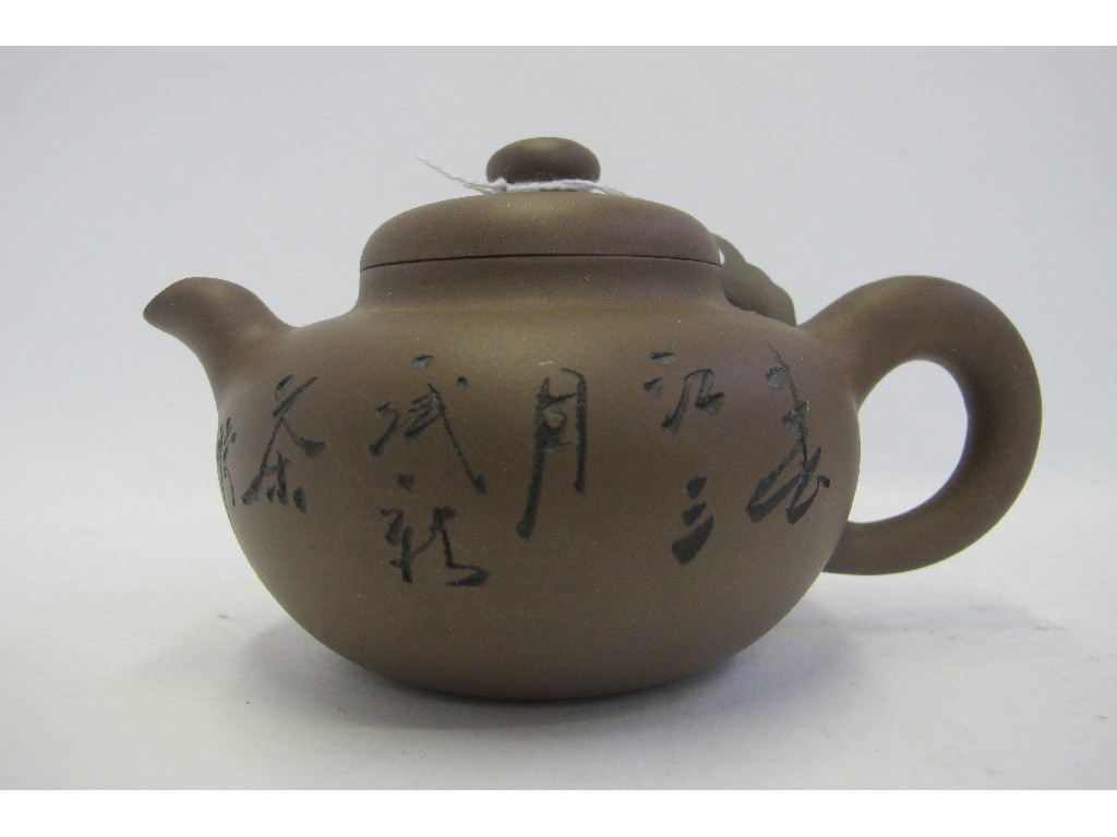 Appraisal: Chinese terracotta teapot with incised stamp to base and script