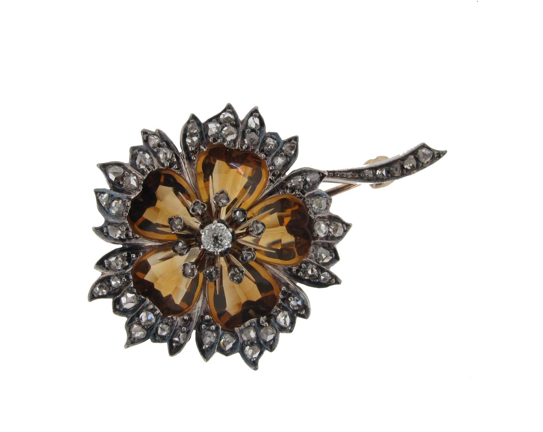 Appraisal: A Victorian citrine and diamond flower head brooch