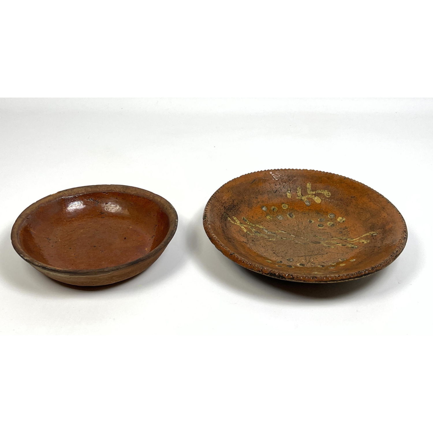 Appraisal: pc American redware plate bowls inch the smaller Dimensions H