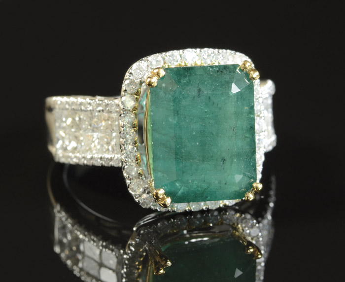 Appraisal: EMERALD DIAMOND AND FOURTEEN KARAT GOLD RING The white and