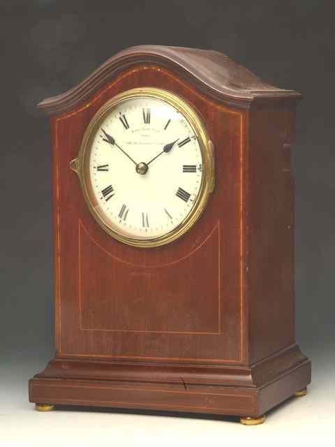 Appraisal: AN EARLY TH CENTURY MAHOGANY EUREKA CLOCK CO LTD LONDON