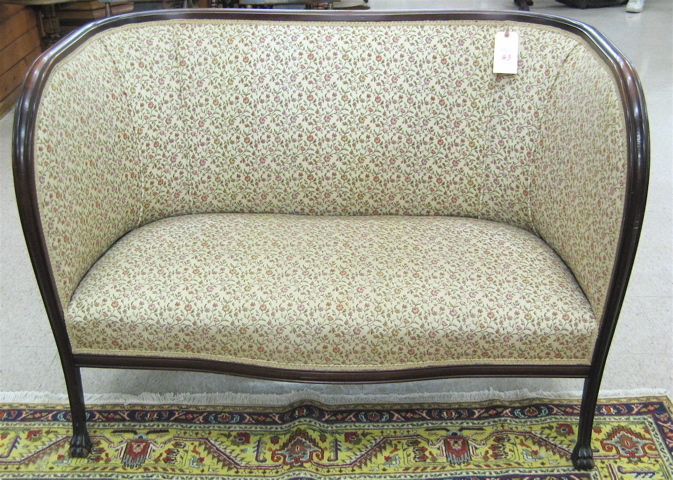 Appraisal: A FLORAL TAPESTRY COVERED MAHOGANY SETTEE American early th century