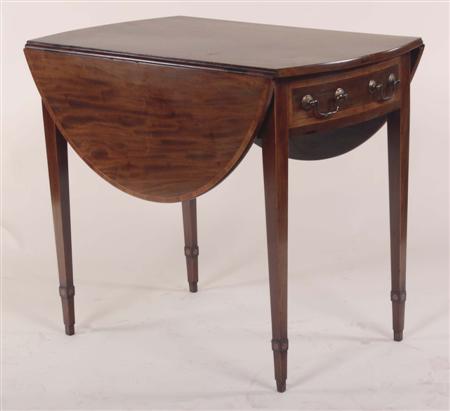 Appraisal: A George III mahogany oval drop leaf table the cross-banded