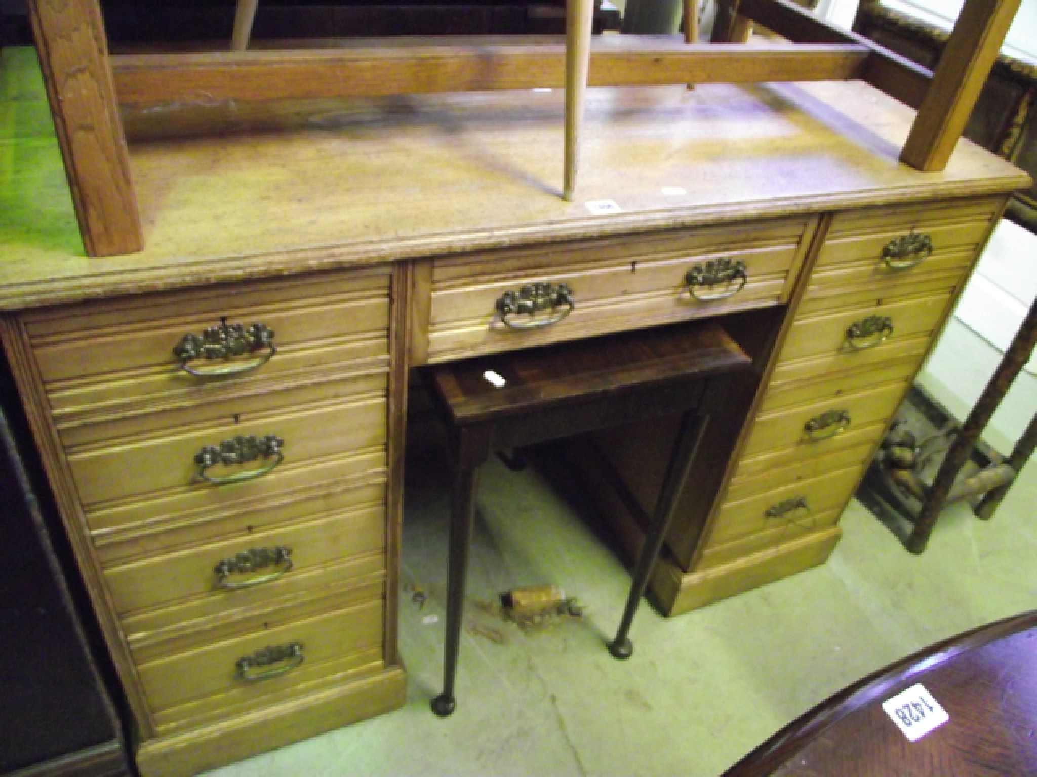 Appraisal: A Victorian ashwood pedestal writing desk fitted with an arrangement