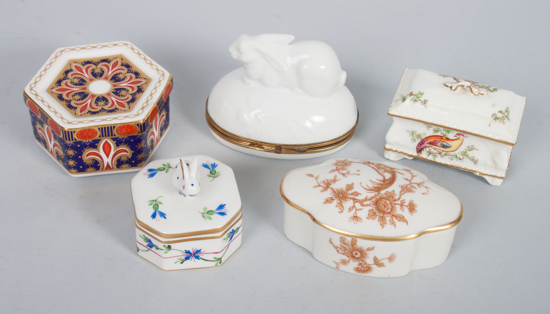 Appraisal: Five assorted porcelain dresser boxes makers include Herend Limoges Royal