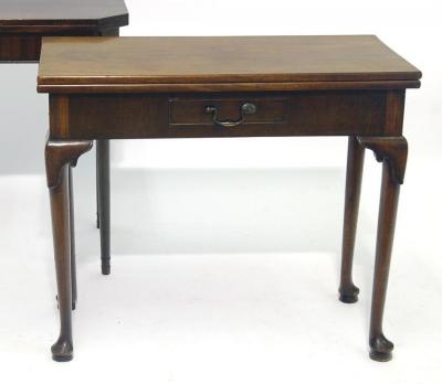 Appraisal: A GEORGE III MAHOGANY FOLDING TEA TABLE of oblong form