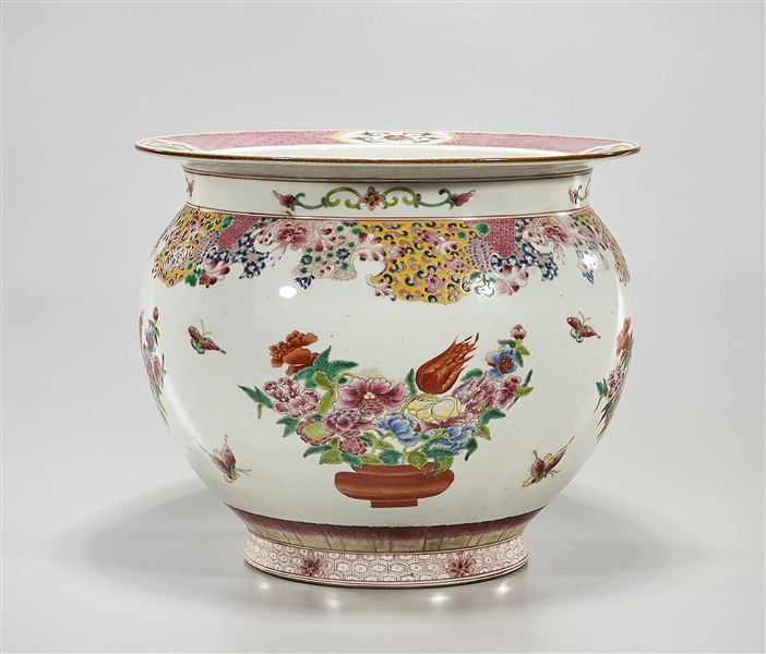 Appraisal: Chinese enameled porcelain jardiniere depicting flowers and butterflies x approx