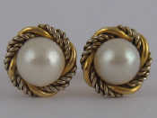 Appraisal: A pair of carat gold cultured pearl earstuds pearls approx