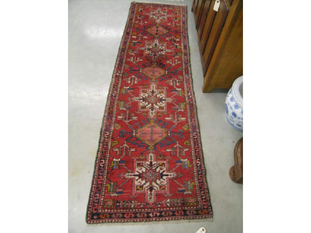 Appraisal: Heriz Persian Handmade Runner geometric medallions red field ' x