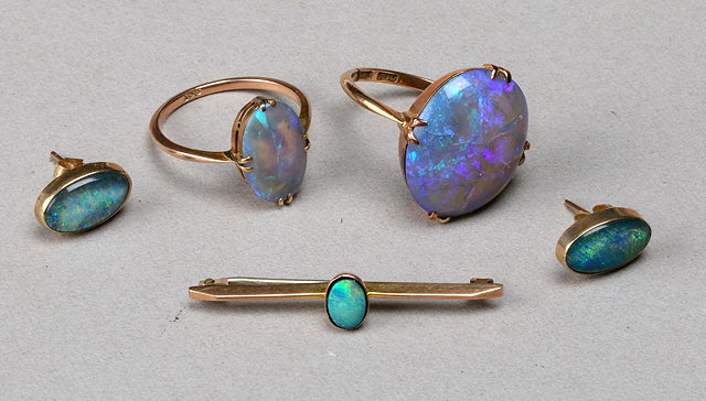 Appraisal: TWO OPAL SET DRESS RINGS both set with claws a