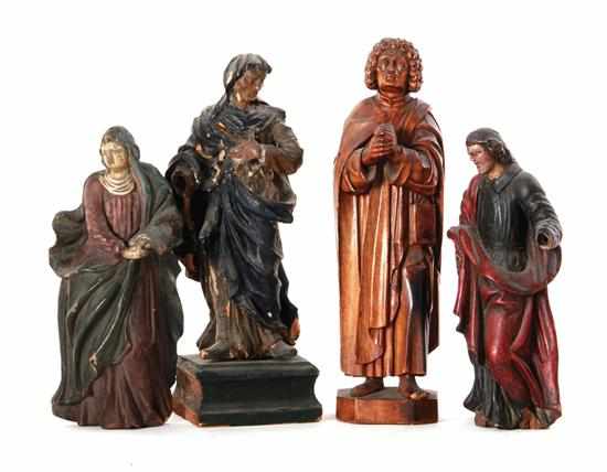 Appraisal: Collection of polychrome carved santos th century standing robed holy