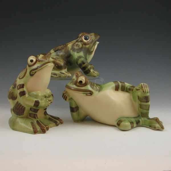 Appraisal: Three Brush frogs including sitting reclining and ornament shapes All