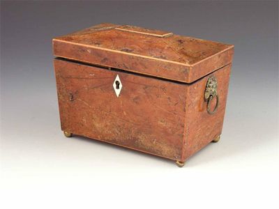 Appraisal: An early th century yew wood sarcophagus shape tea caddy