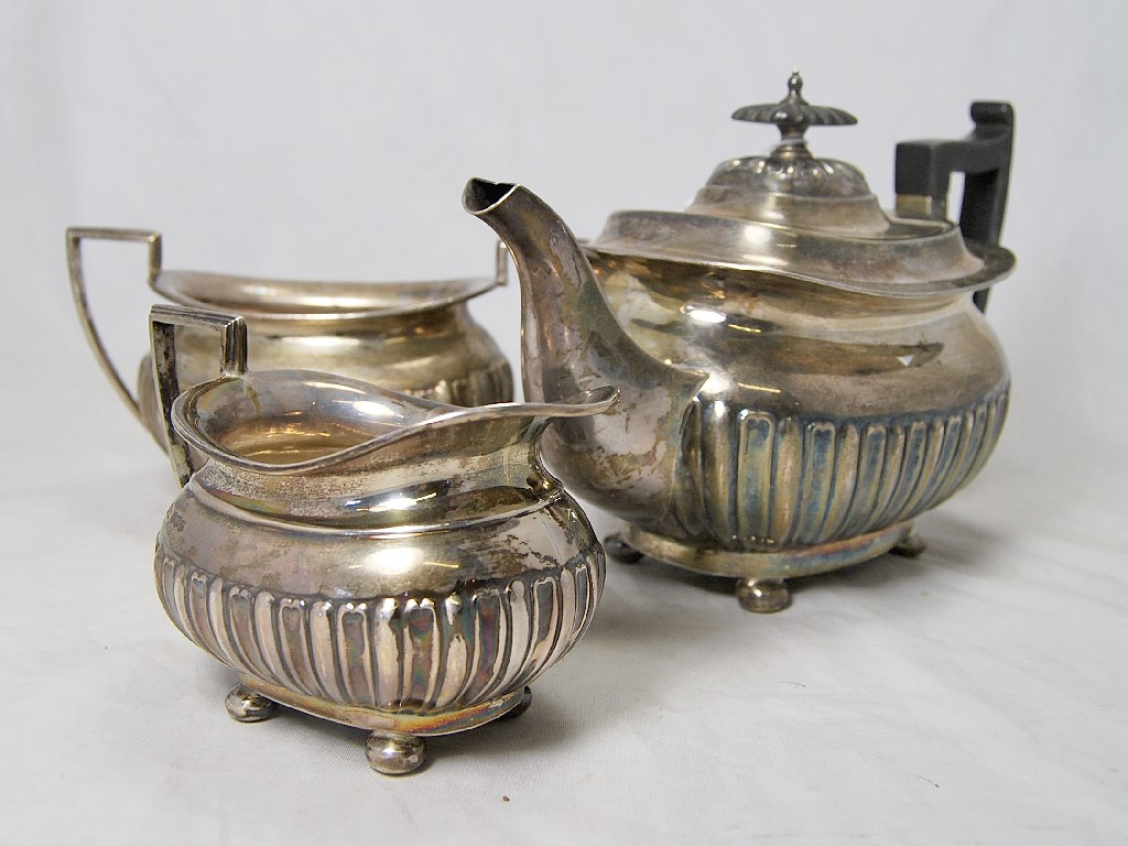 Appraisal: Three piece silver half fluted rectangular tea service on four