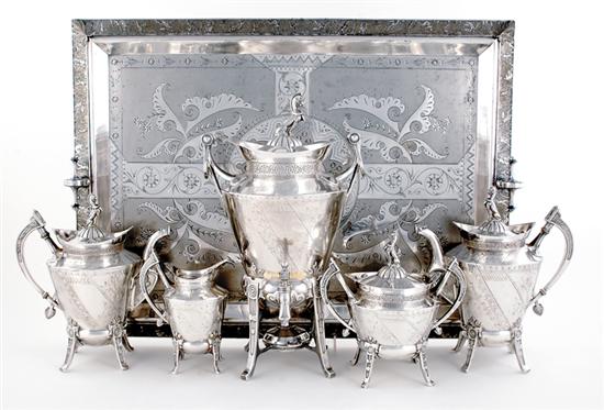 Appraisal: American Aesthetic Movement silverplate coffee and tea service griffon finials