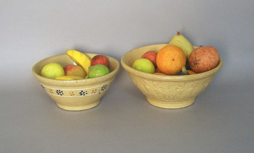 Appraisal: Two yelloware bowls with stone fruit