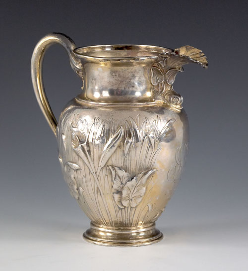 Appraisal: Continental silver art nouveau water pitcher with repousse floral decoration