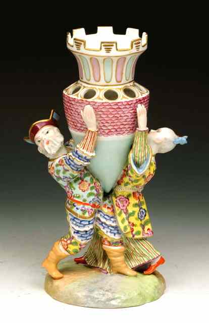 Appraisal: A MEISSEN PORCELAIN GROUP in the form of two actors