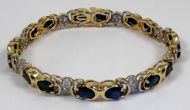 Appraisal: SAPPHIRE AND DIAMOND BRACELET The k yellow and white gold