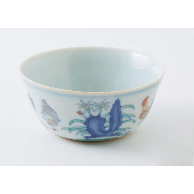 Appraisal: Oriental Porcelain Tea Cup th c decorated with chickens and