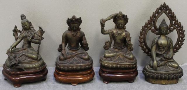 Appraisal: Group of Southeast Asian Bronze Figures All seated Buddhas Three