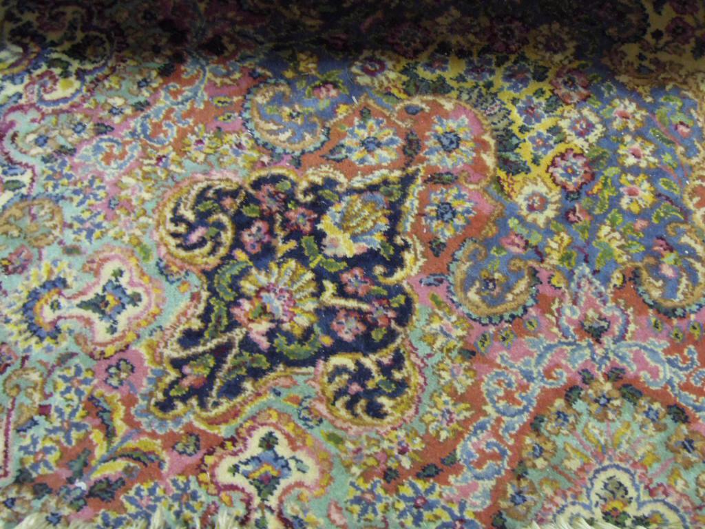 Appraisal: A Persian design carpet with an all over floral pattern