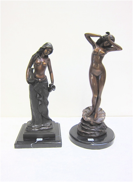 Appraisal: TWO PATINATED BRONZE STANDING WOMEN both cast in standing poses