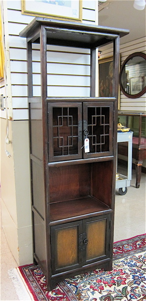 Appraisal: NARROW MING-STYLE DISPLAY CABINET Chinese or Korean th century having