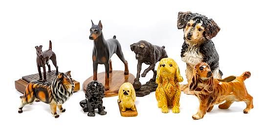 Appraisal: A Group of Nine Dog Figures of Various Breed Height