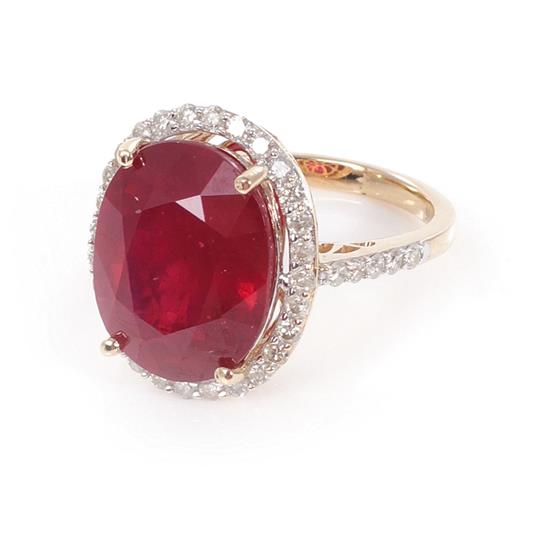 Appraisal: Ruby and diamond ring ct oval natural ruby accented by