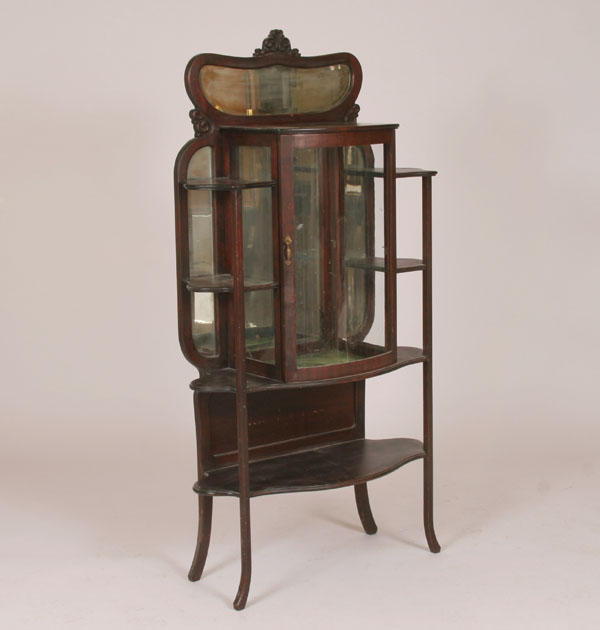 Appraisal: Art Nouveau mirrored etagere bow front display cabinet with shaped