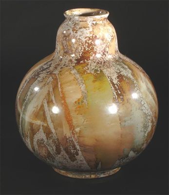 Appraisal: An Arabia Finland ovoid vase covered in a splashed orange