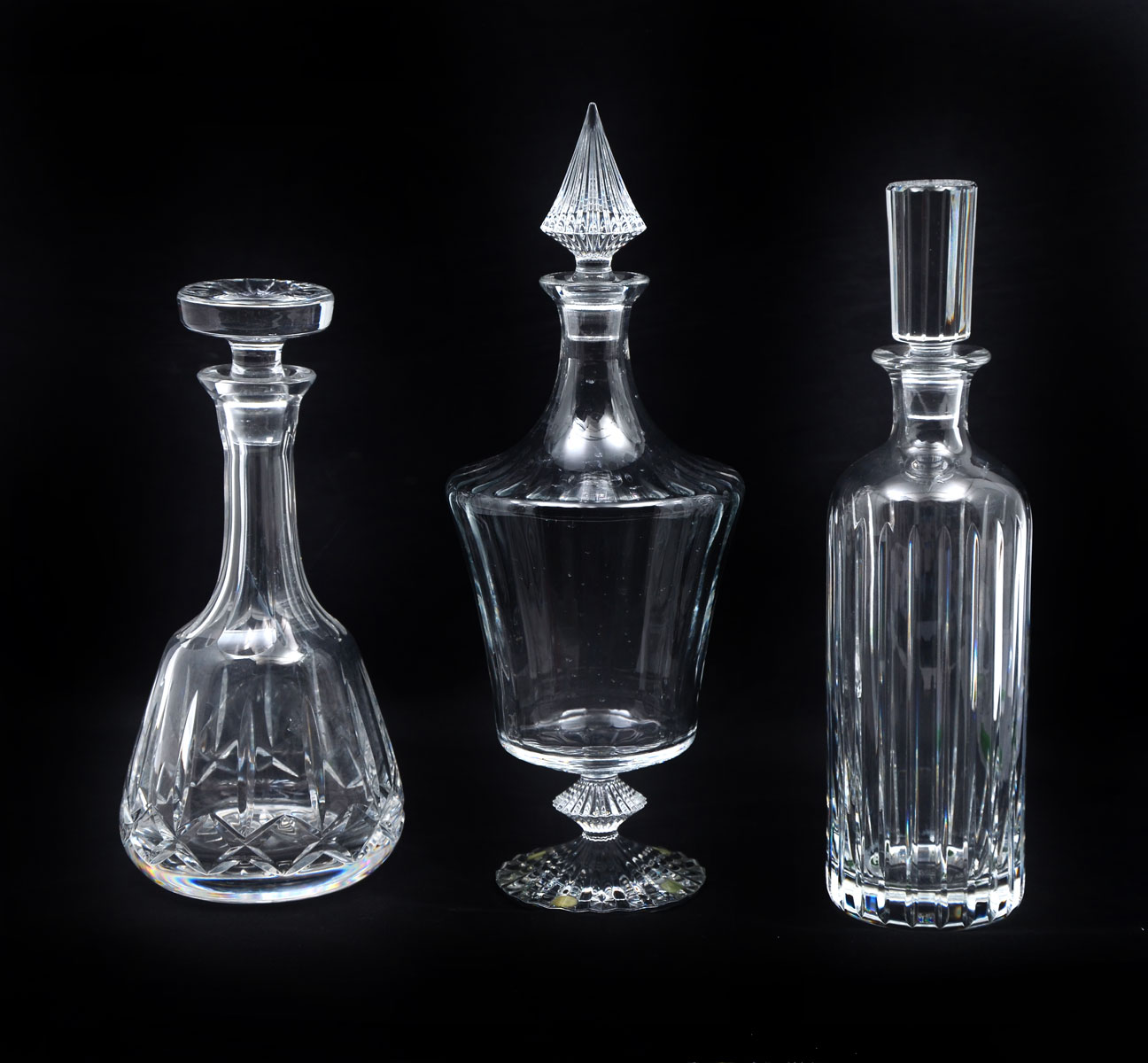 Appraisal: RIBBED BACCARAT ATLANTIS CRYSTAL DECANTERS Comprising - Baccarat decanters having