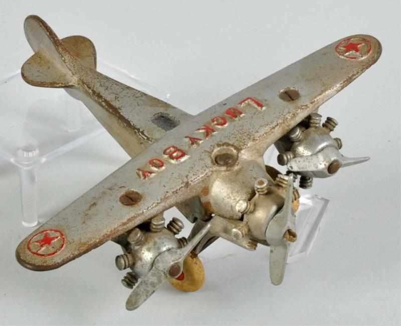 Appraisal: Cast Iron Hubley Tri-Motor Lucky Boy Airplane Toy Description American