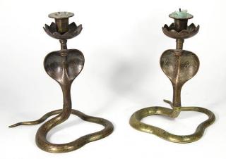 Appraisal: Pair of Indian figural cobra candle holders Pair of Indian