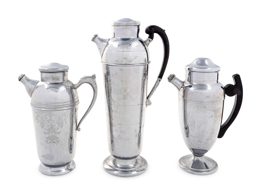 Appraisal: A Group of Three Cocktail Shakers A Group of Three