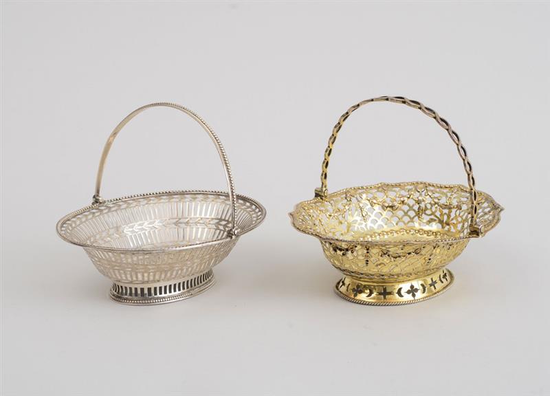 Appraisal: GEORGE III CRESTED SILVER SWEETMEAT BASKET AND A GEORGE III