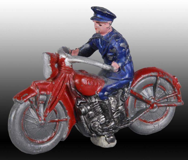 Appraisal: Unusual Japanese Lead Motorcycle Toy Description Pre-war Policeman rider Japan