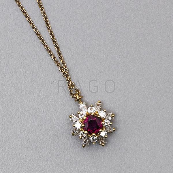 Appraisal: K YELLOW GOLD DIAMOND AND RUBY STARBURST PENDANT Condition Report