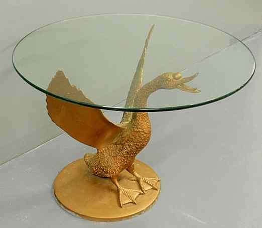 Appraisal: Brass figural snow goose coffee table with a round glass