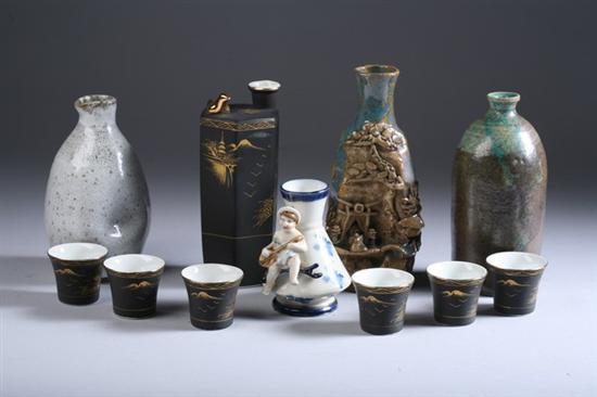 Appraisal: FIVE JAPANESE SAKI BOTTLES Three stoneware signed one gilt and